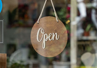 open sign on a shop door